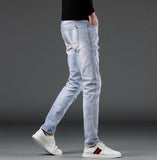 Eddy Ripped Slim Fit Jeans